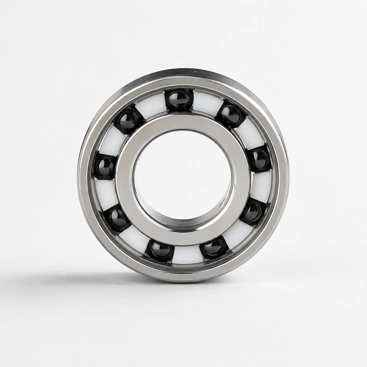 Hybrid ceramic insulated motor bearings for VFD